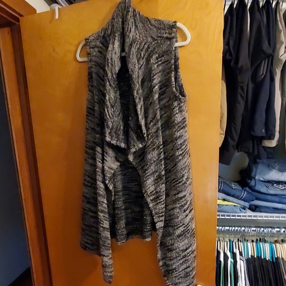 Long asymmetrical vest